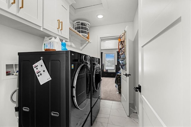 clothes washing area with recessed lighting, cabinet space, marble finish floor, and washer and clothes dryer