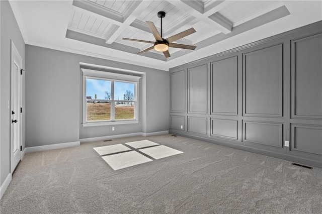 unfurnished bedroom with light carpet, visible vents, coffered ceiling, crown molding, and beam ceiling