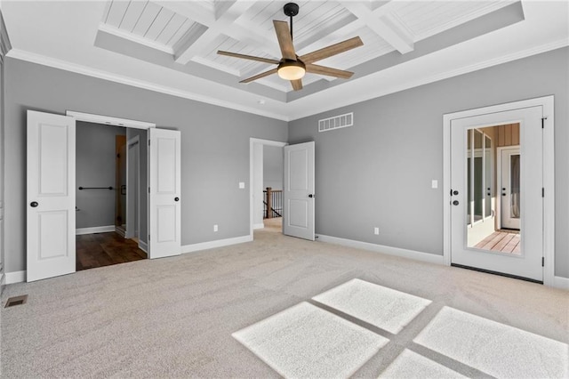 unfurnished bedroom featuring carpet, visible vents, coffered ceiling, and baseboards