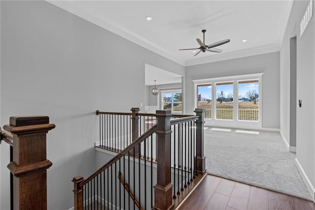 2407 Merlot Pl, Excelsior Springs, MO 64024 - stairs featuring a ceiling fan, ornamental molding, hardwood / wood-style flooring, recessed lighting, and carpet