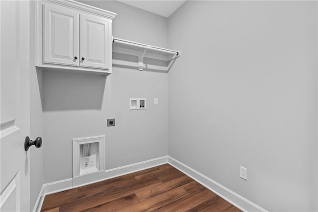 2407 Merlot Pl, Excelsior Springs, MO 64024 - washroom featuring hookup for an electric dryer, washer hookup, dark wood finished floors, and cabinet space