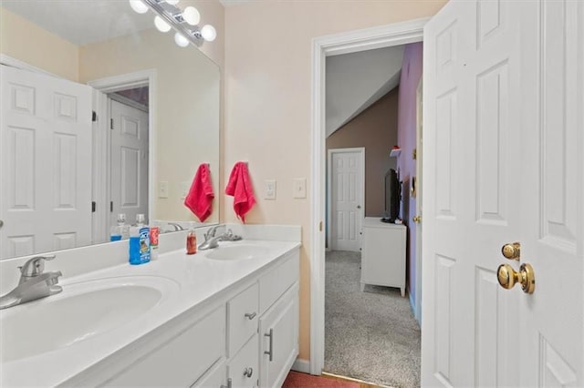 full bath featuring a sink and double vanity