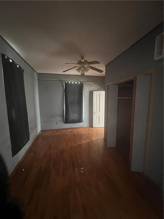 hallway with wood finished floors