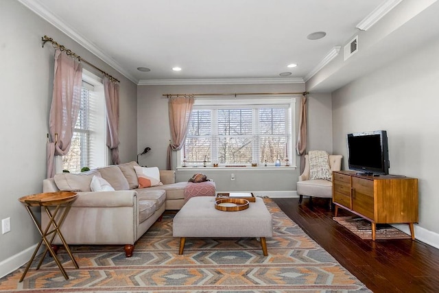 living area featuring visible vents, baseboards, dark wood-type flooring, and crown molding