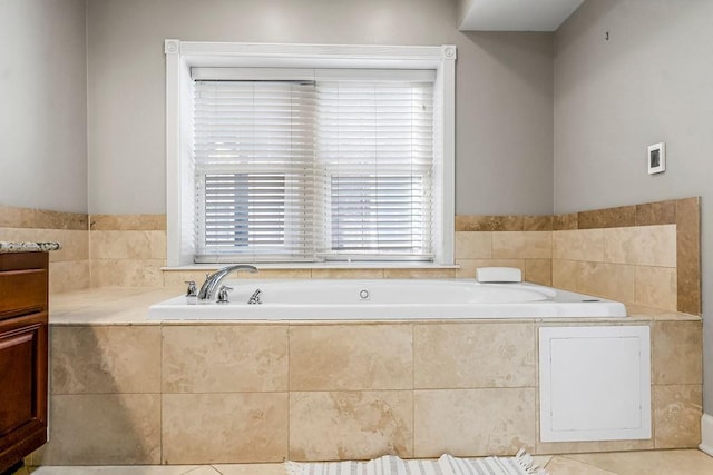 bathroom with a bath and vanity