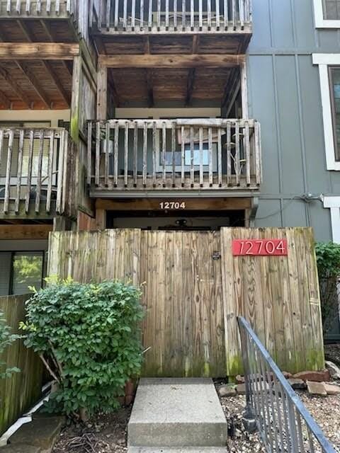 12704 W 110th Ter, Overland Park, KS 66210 - doorway to property featuring a balcony