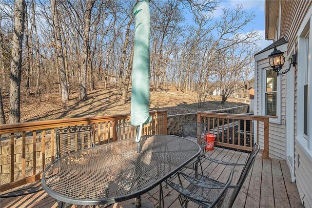 deck with outdoor dining space