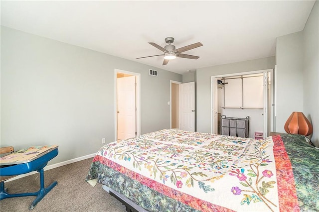 bedroom with visible vents, a ceiling fan, a closet, carpet floors, and baseboards