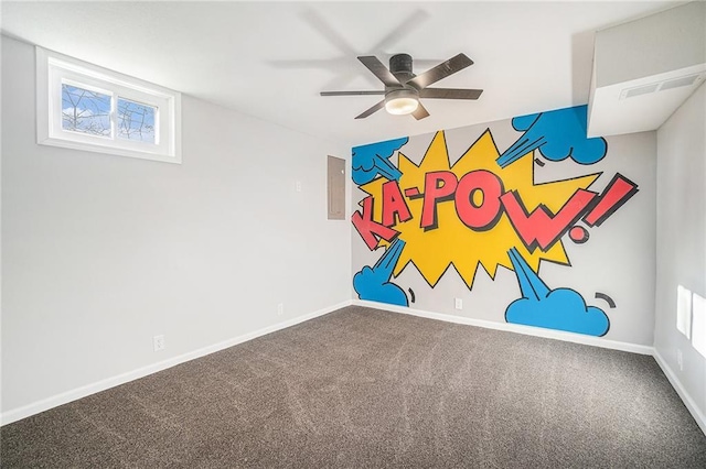 interior space featuring baseboards, visible vents, and ceiling fan