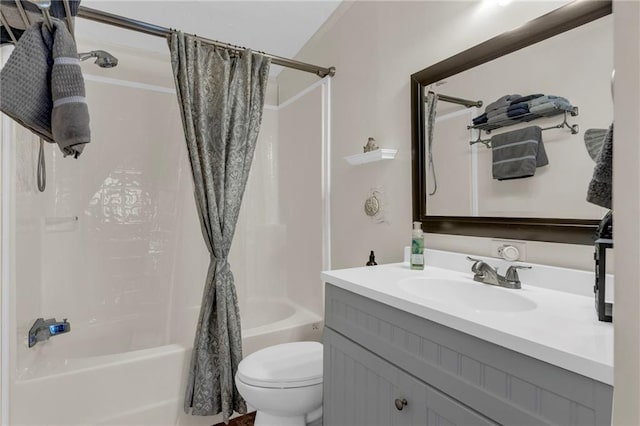 full bath featuring vanity, toilet, and shower / bathtub combination with curtain