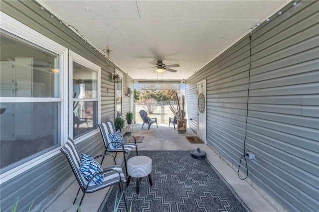 view of patio featuring a porch and a ceiling fan