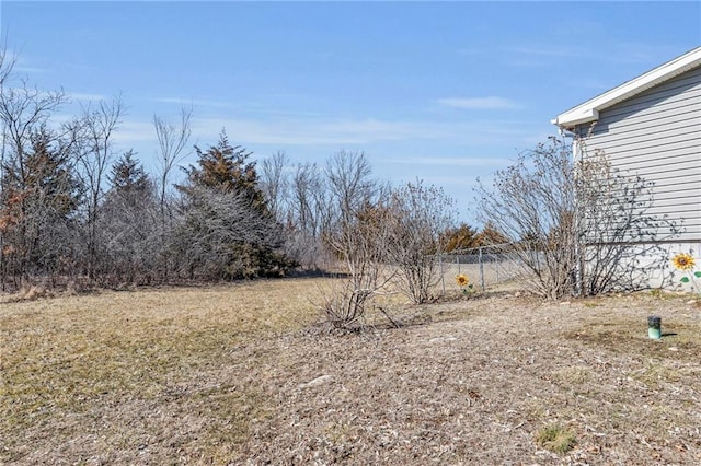 view of yard featuring fence