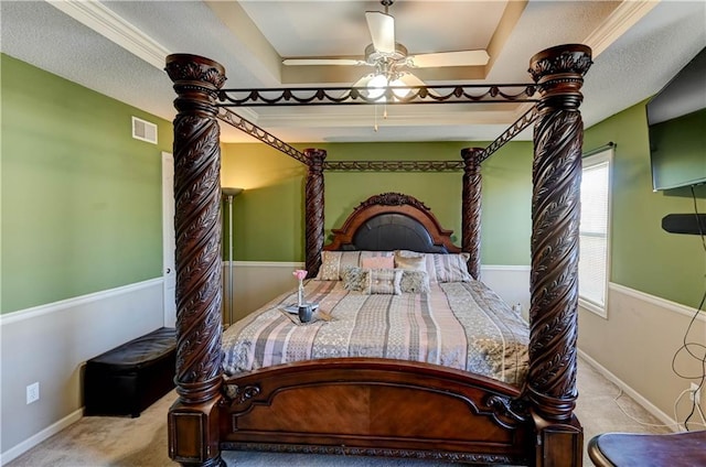 unfurnished bedroom featuring carpet floors, baseboards, visible vents, and a raised ceiling