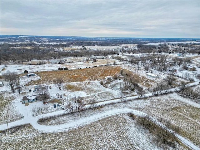 snowy aerial view with a rural view