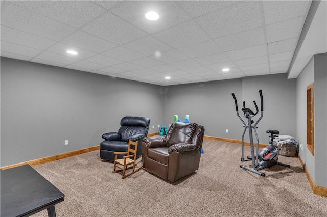 exercise room with recessed lighting, carpet, baseboards, and a drop ceiling