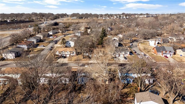 birds eye view of property with a residential view