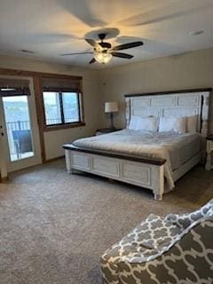 unfurnished bedroom featuring access to outside, a ceiling fan, and light colored carpet