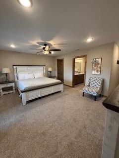 bedroom with light colored carpet