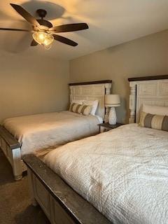 bedroom featuring ceiling fan