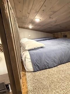 bedroom with wooden ceiling