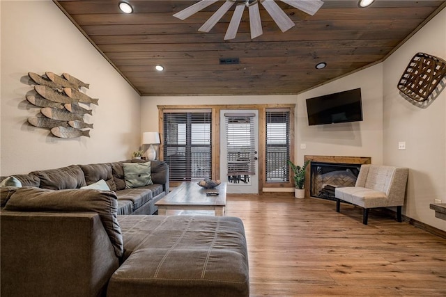 164 Dogwood Park Trl, Branson, MO 65616 - living room featuring a glass covered fireplace, wooden ceiling, lofted ceiling, and wood finished floors