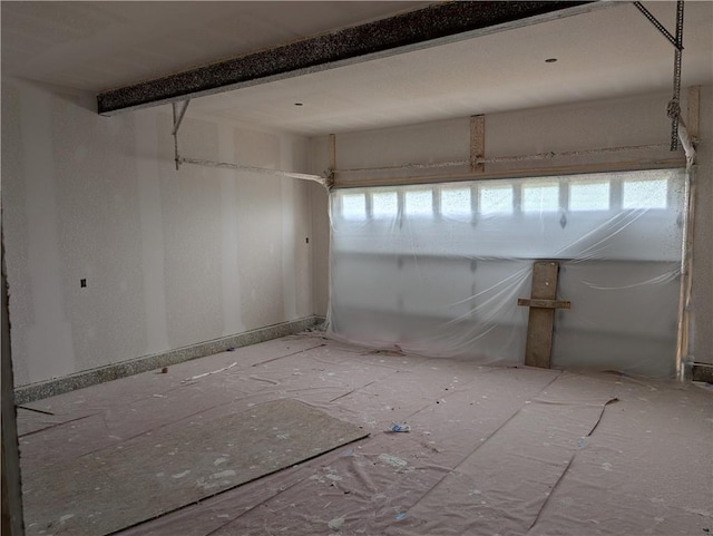 1107 Charles St, Knob Noster, MO 65336 - empty room with plenty of natural light