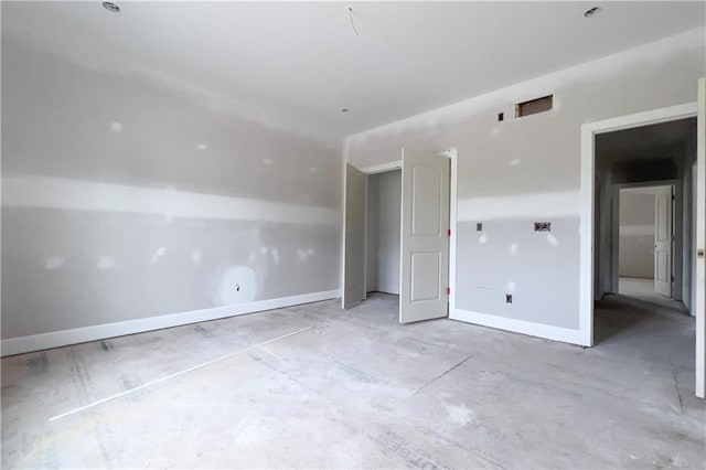 1107 Charles St, Knob Noster, MO 65336 - unfurnished bedroom with baseboards