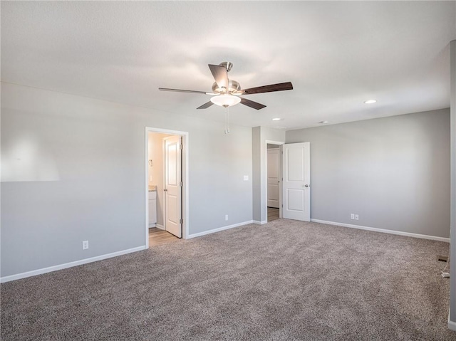 unfurnished room with light carpet, ceiling fan, baseboards, and recessed lighting