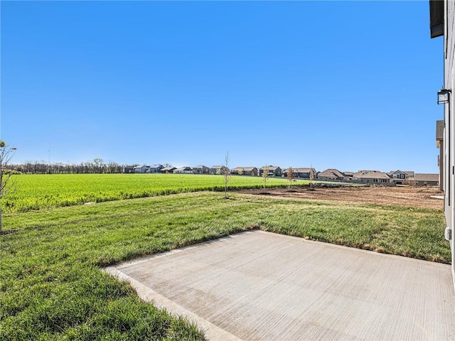 view of yard featuring a residential view