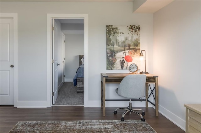 office with baseboards and wood finished floors