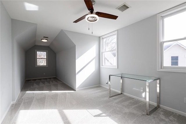 bonus room with visible vents, carpet floors, a ceiling fan, and vaulted ceiling