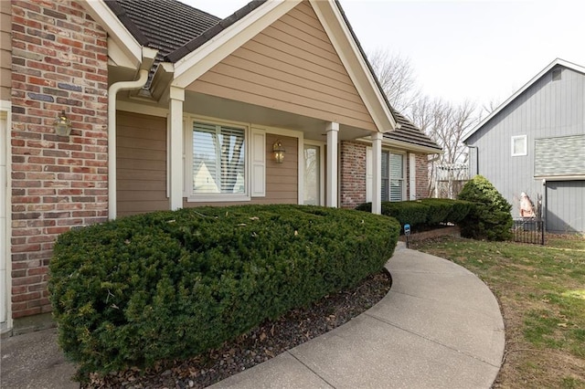 entrance to property with brick siding