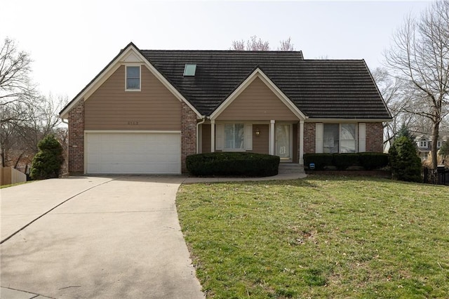 new england style home featuring brick siding, driveway, a front lawn, and a garage