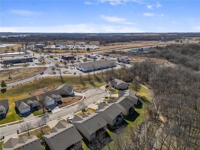 birds eye view of property with a residential view