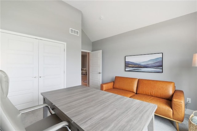 home office featuring visible vents and high vaulted ceiling