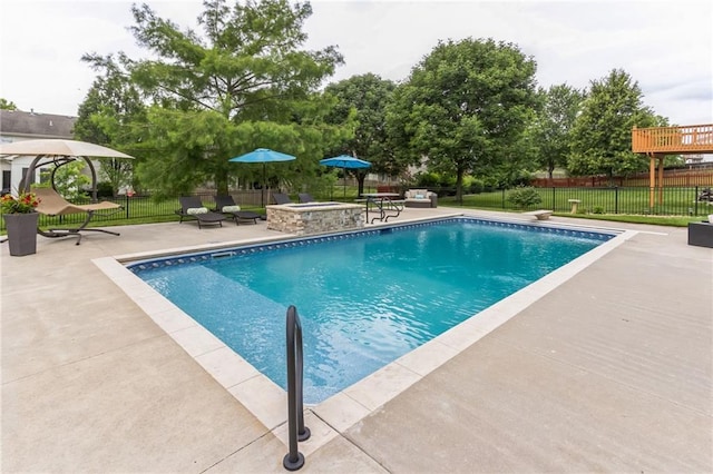 view of pool featuring a patio area, fence, a fenced in pool, and a yard