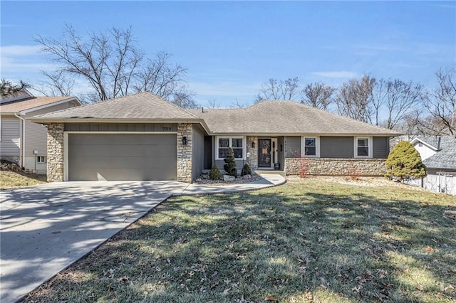 ranch-style home with a garage, a shingled roof, concrete driveway, stone siding, and a front lawn