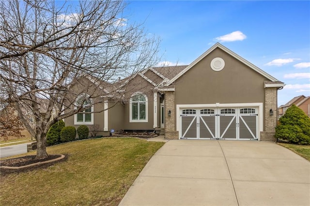 single story home featuring brick siding, a front lawn, concrete driveway, stucco siding, and a garage