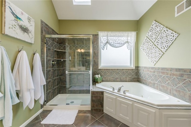 full bathroom with visible vents, a garden tub, a stall shower, and tile patterned flooring