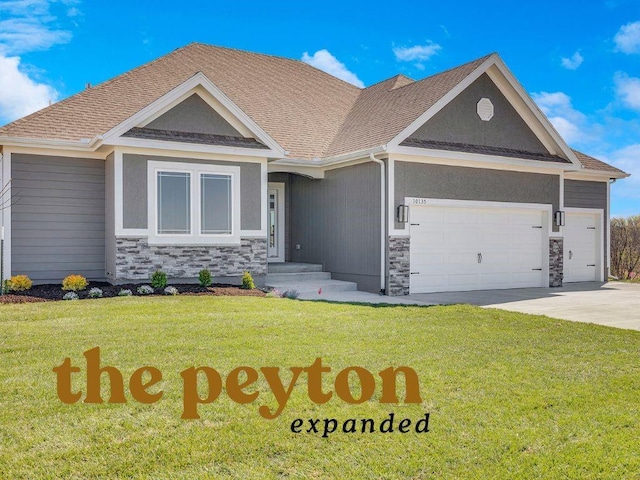 10216 N Winchester Ave, Kansas City, MO 64156 - single story home with stone siding, an attached garage, a front lawn, and concrete driveway