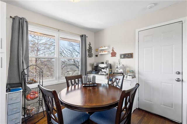 dining area with dark wood-type flooring