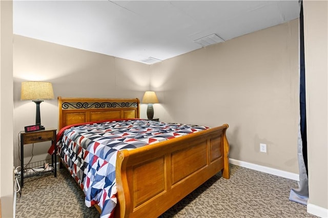 bedroom with visible vents, baseboards, and carpet