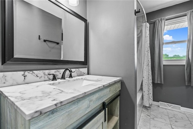 904 E Golf Hill Dr, Excelsior Springs, MO 64024 - full bathroom with marble finish floors, vanity, and baseboards