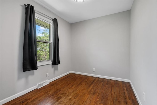 904 E Golf Hill Dr, Excelsior Springs, MO 64024 - empty room with baseboards and dark wood finished floors
