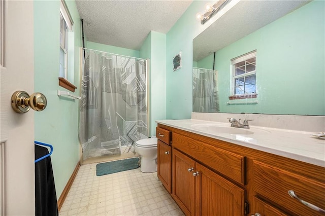 full bath featuring toilet, a shower with curtain, tile patterned floors, a textured ceiling, and vanity