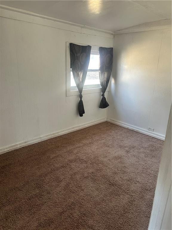 unfurnished room with carpet floors and ornamental molding