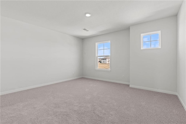 21800 Lucca Ln, Peculiar, MO 64078 - empty room featuring healthy amount of natural light and light colored carpet