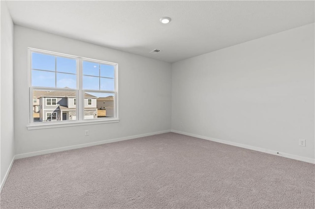 21800 Lucca Ln, Peculiar, MO 64078 - carpeted spare room with baseboards