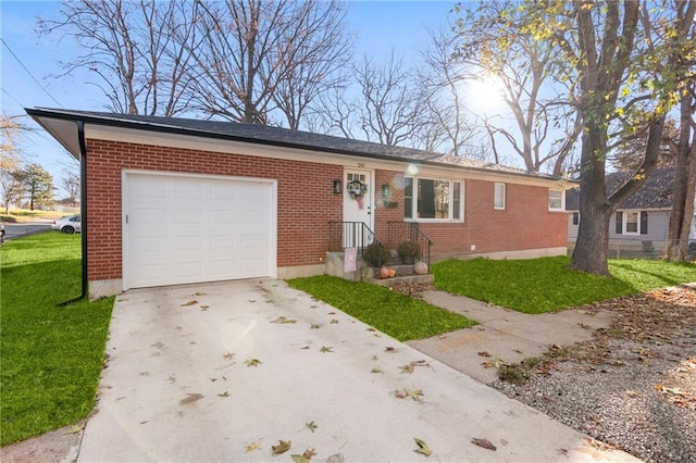 ranch-style home featuring concrete driveway, brick siding, an attached garage, and a front yard