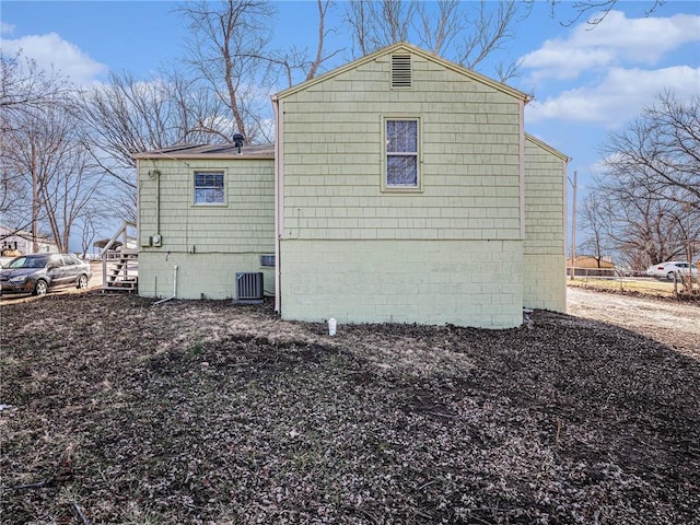 view of property exterior featuring central AC unit